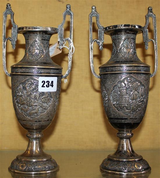 Pair of Eastern embossed vases
